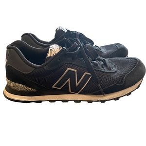 New Balance size 8 women’s tennis shoe! Animal print detailing.